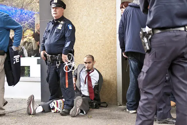 Julio Jose Jiminez-Artunduaga in custody outside Citibank in Greenwich Village